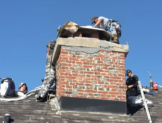 Mission Viejo Chimney Sweep installing a custom chimney crown in Mission Viejo, CA